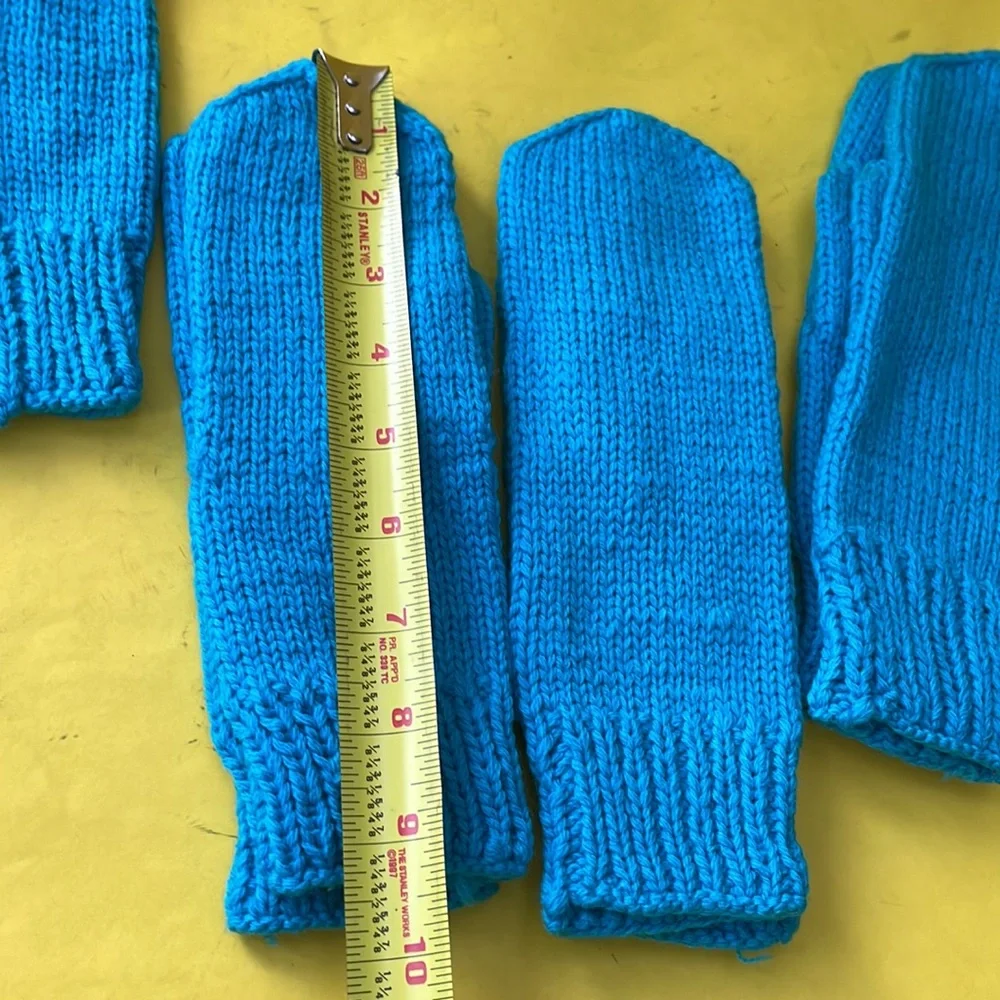 New turquoise hand knitted wool mittens
